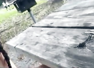 She jerks off her boyfriend next to strangers