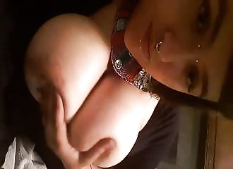 Playing with big titties